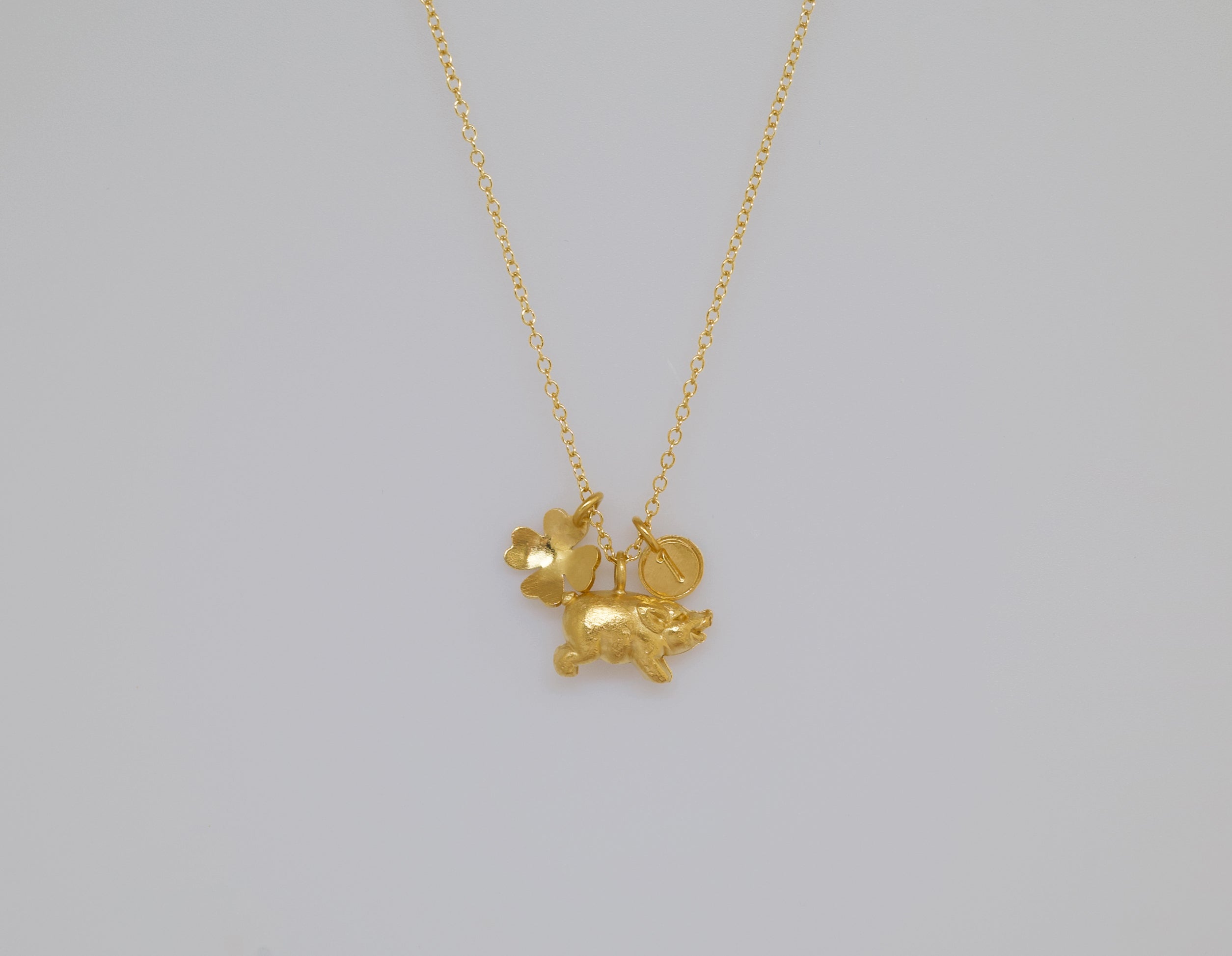 collier Piggy Grigri doré